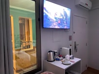 Window opens inside to hotel hallway