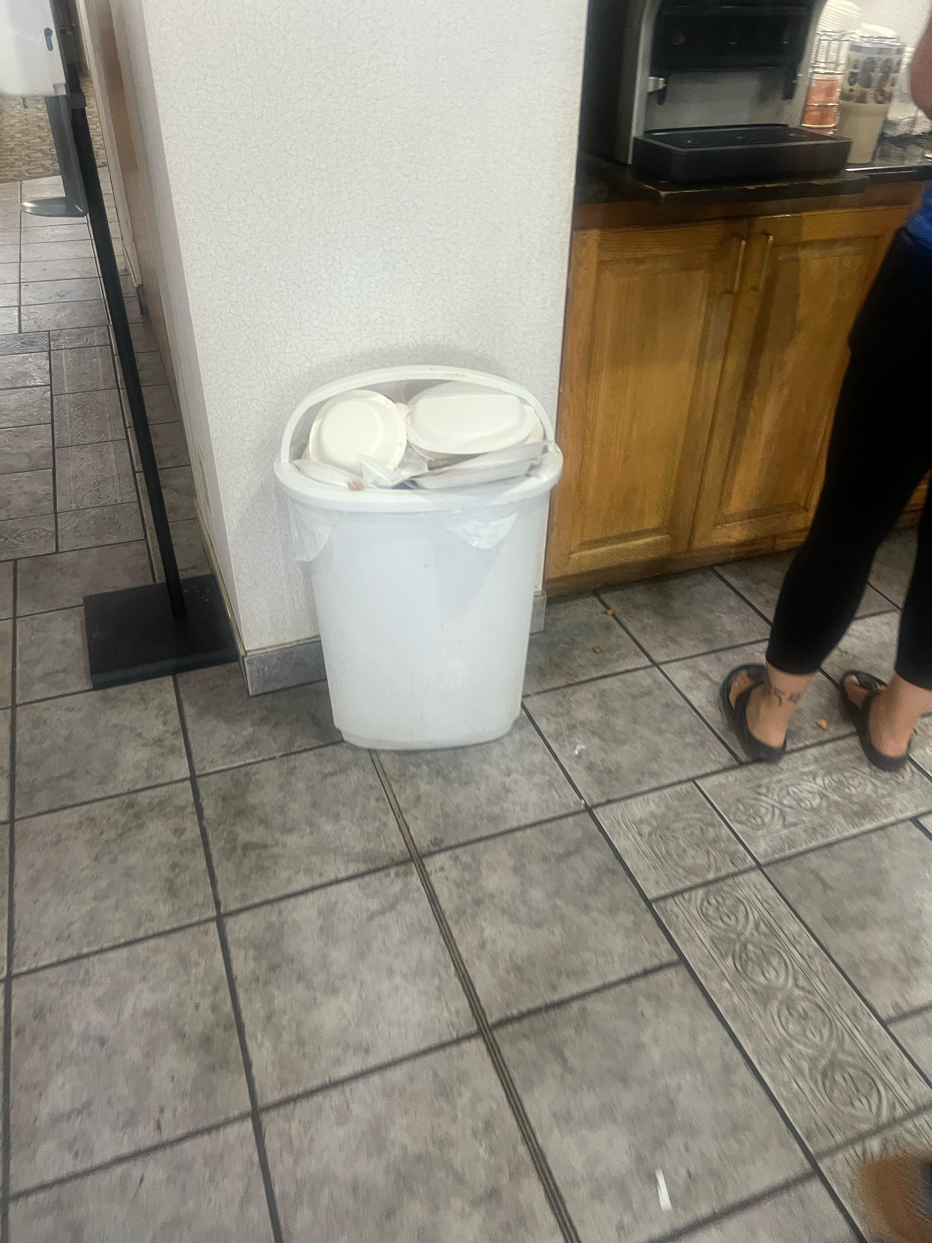 Overflowing garbage.  