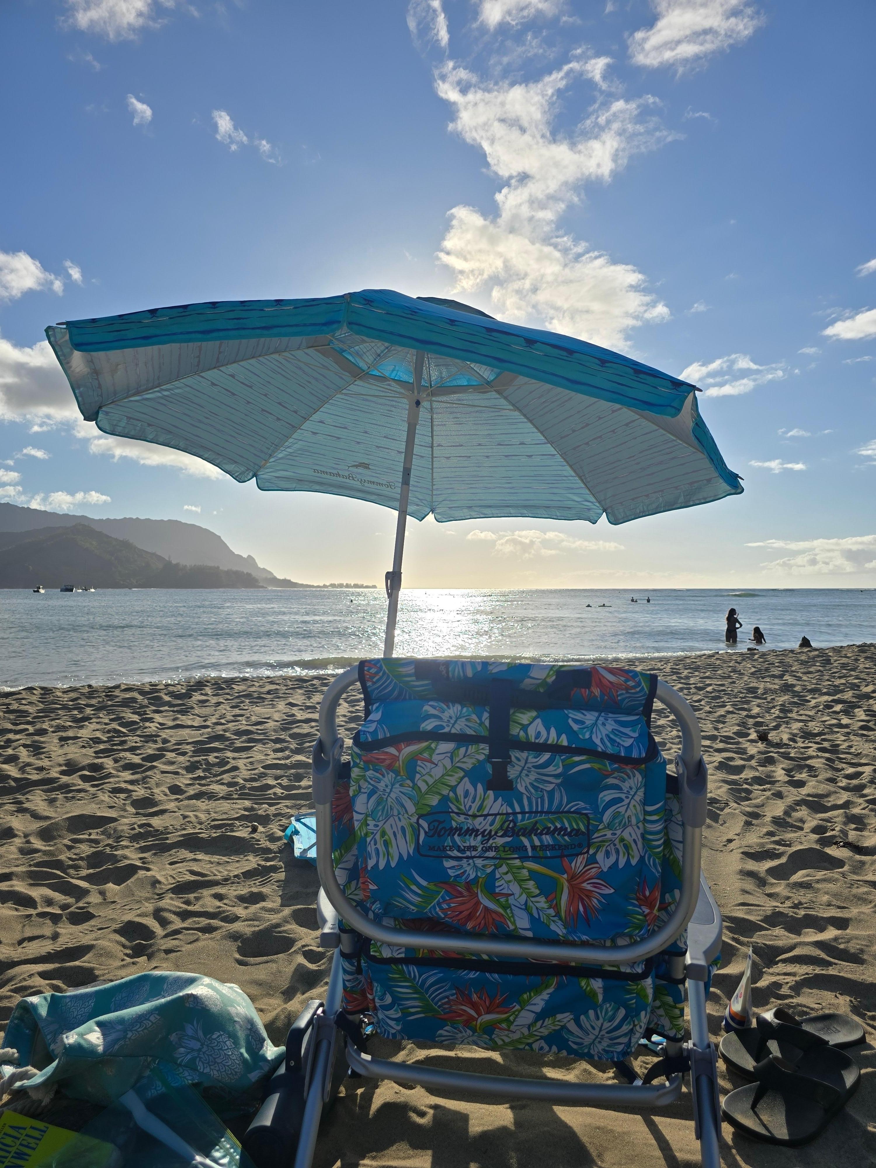 Our chairs and umbrella at Hanalei Bay
