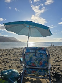 Our chairs and umbrella at Hanalei Bay