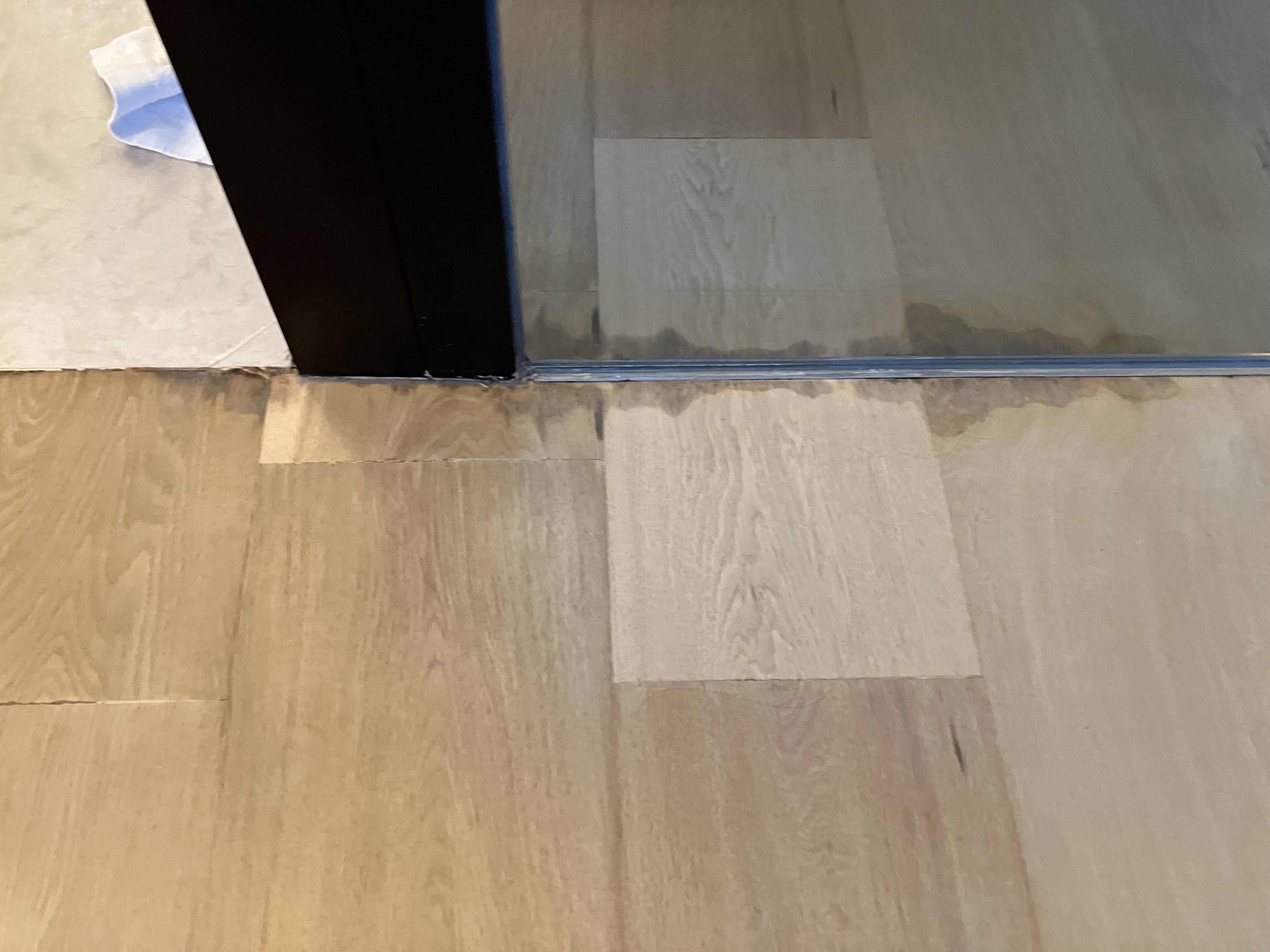 Water stain on the floor of our room