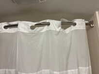 Ripped shower curtain