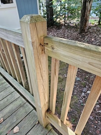 Railings on walway to front door. Dangerous especially for young children.