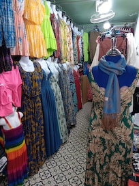 Go left around the corner you will find all Thai clothing, I loved it