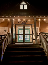 Back view at night from patio