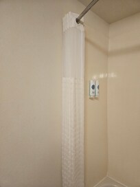 Perfectly ironed shower curtain.