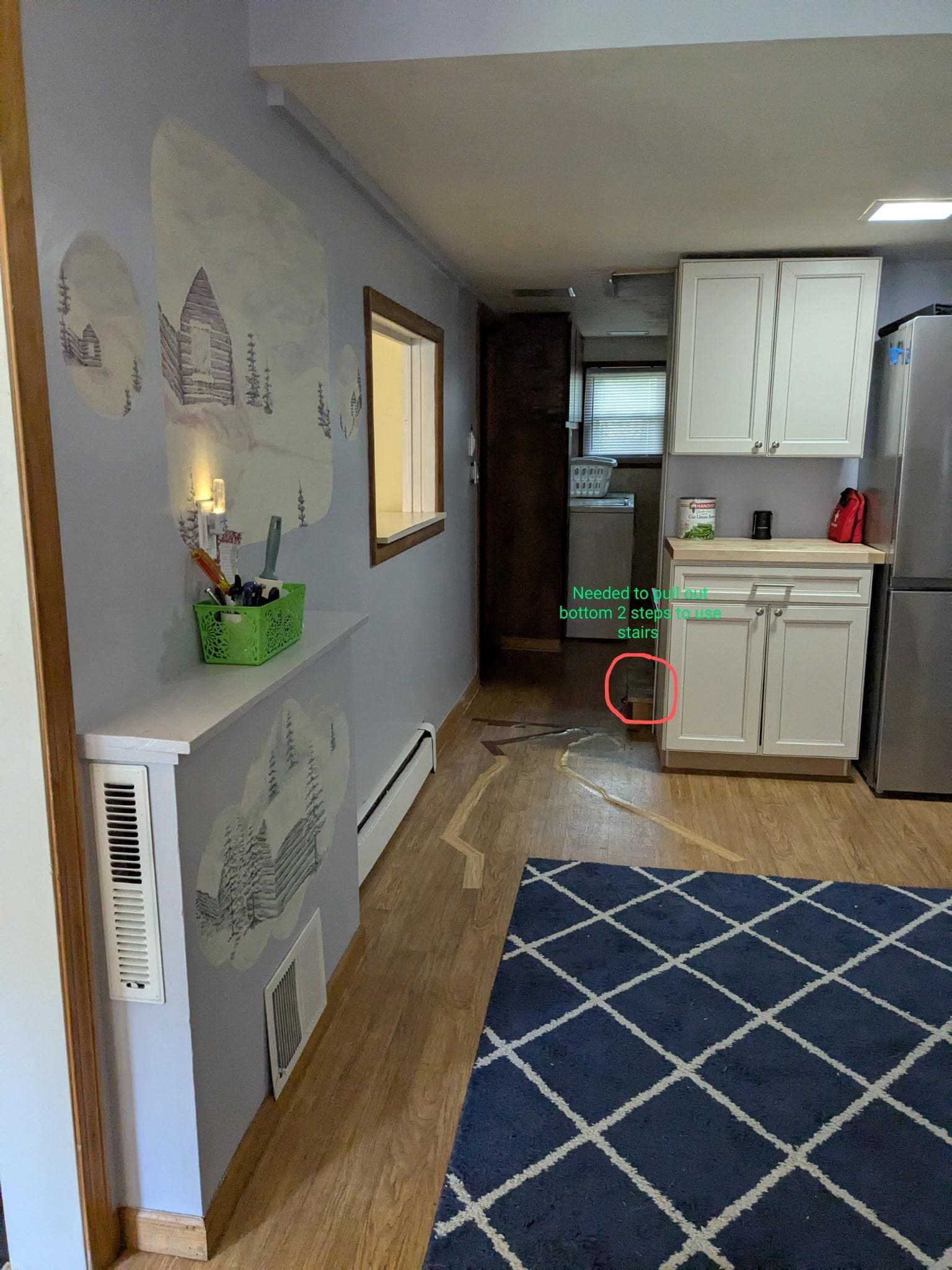 Red circling where bottom two steps need pushed in to walk to bathrooms