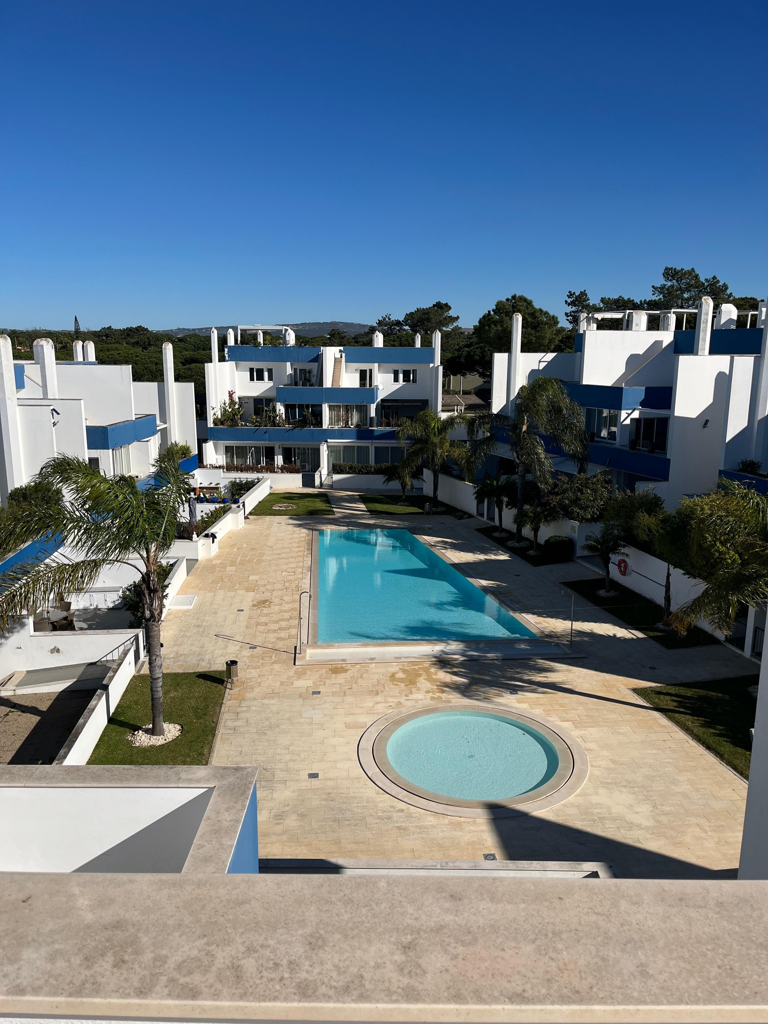 View from the roof terrace across the pools