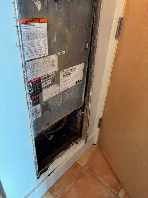 We found this wall open. It looks like maintenance was halfway done.