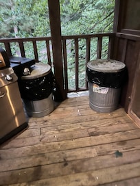 Trash cans not in caged area