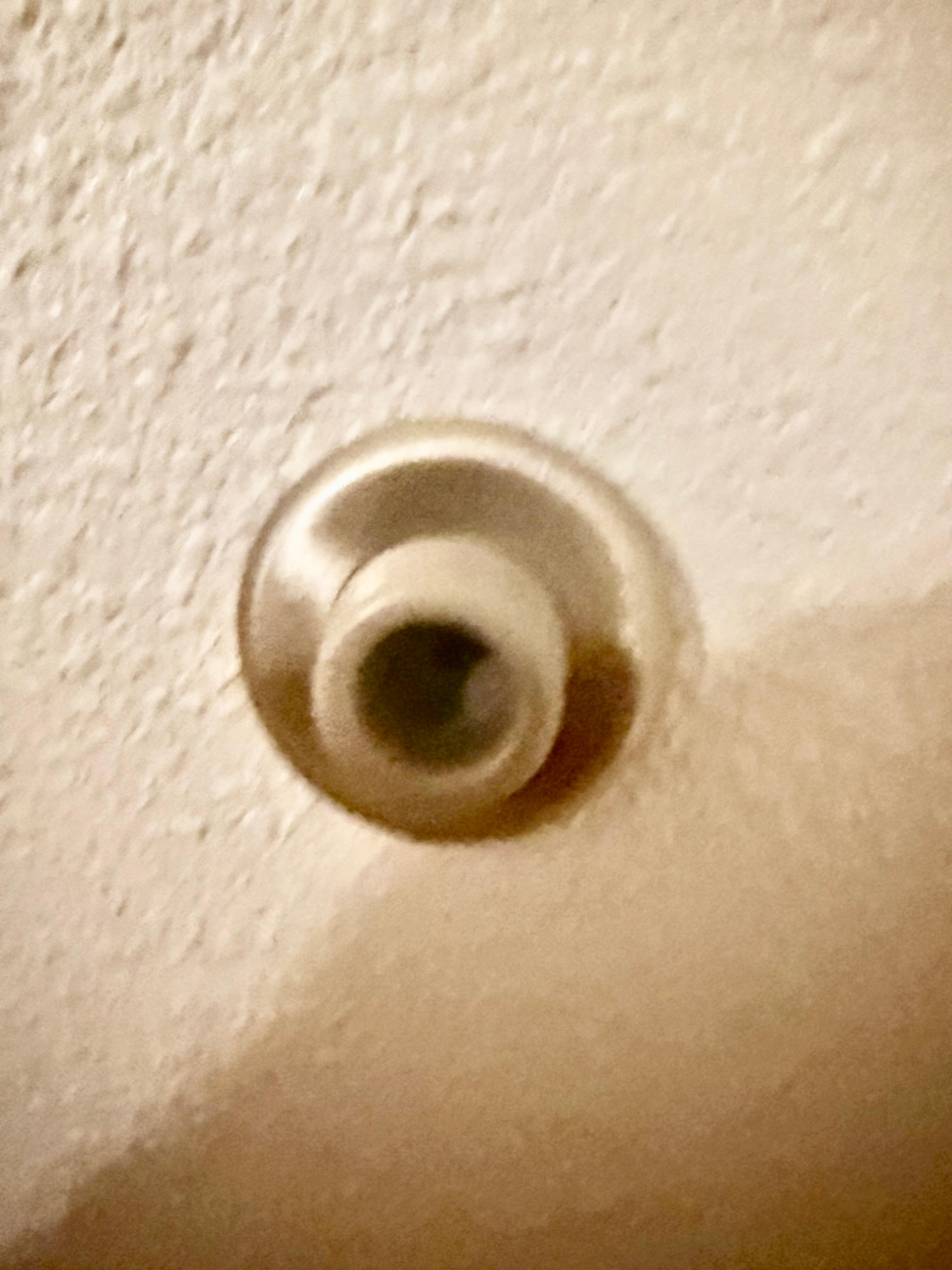 This door knob stopper in the back of the door had a camera in it that camera disappeared