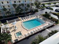 Photo of pool from right outside condo room