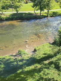 River behind indoor pool house.