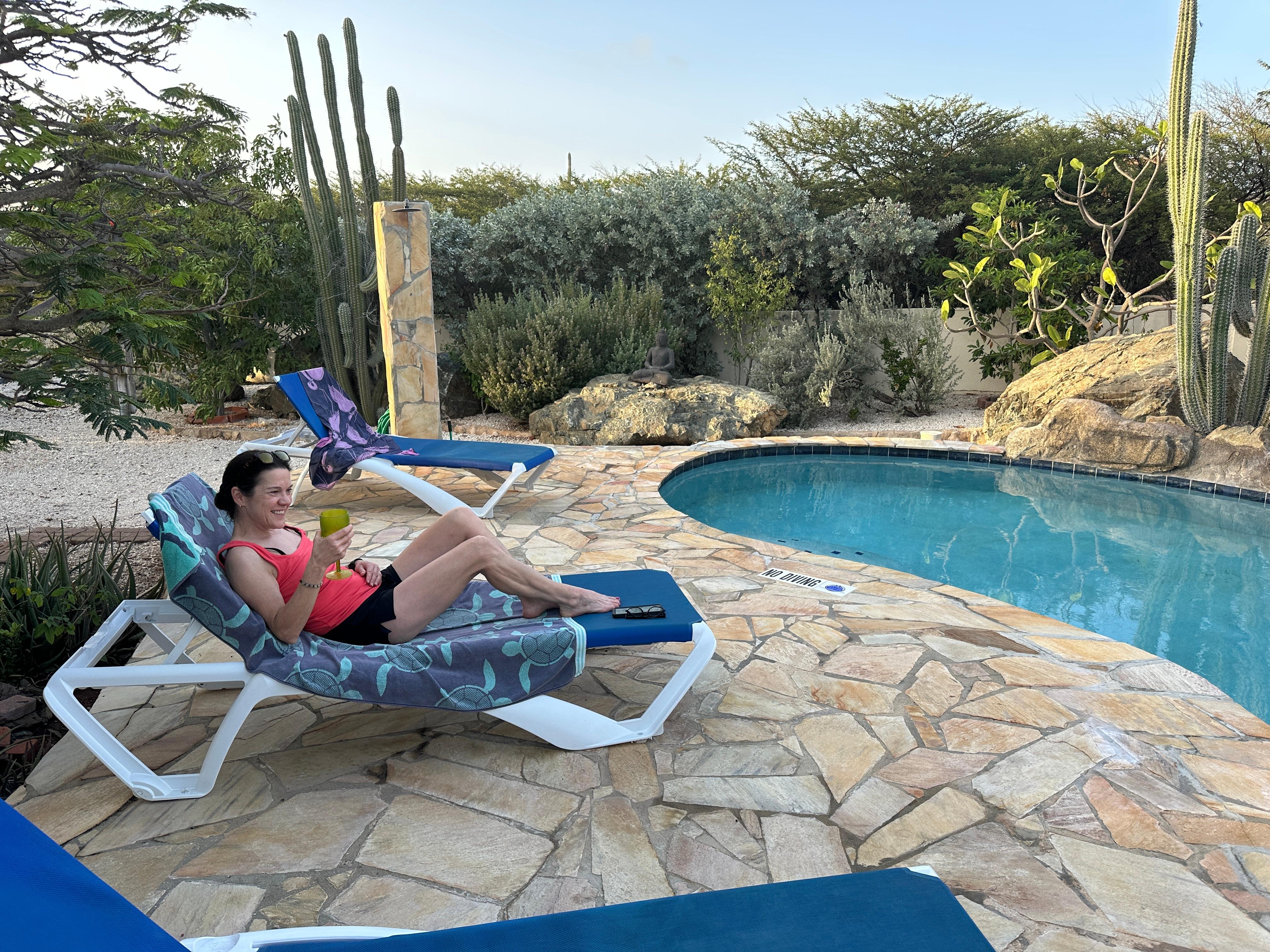 Relaxing in the peaceful pool area.