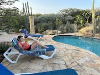 Relaxing in the peaceful pool area.