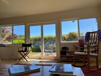 View from the couch, looking out to the backyard