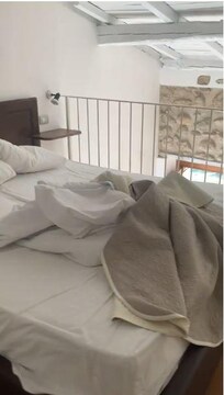 Upstairs balcony being treated as a bedroom as there is a door. Would be useful to have a hanging rail to place clothes