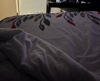 This is bed leaning after wood piece placed under corner foot of bed. Compare to the table.