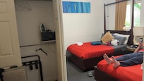 2 Queen bedroom with view of closet and safe