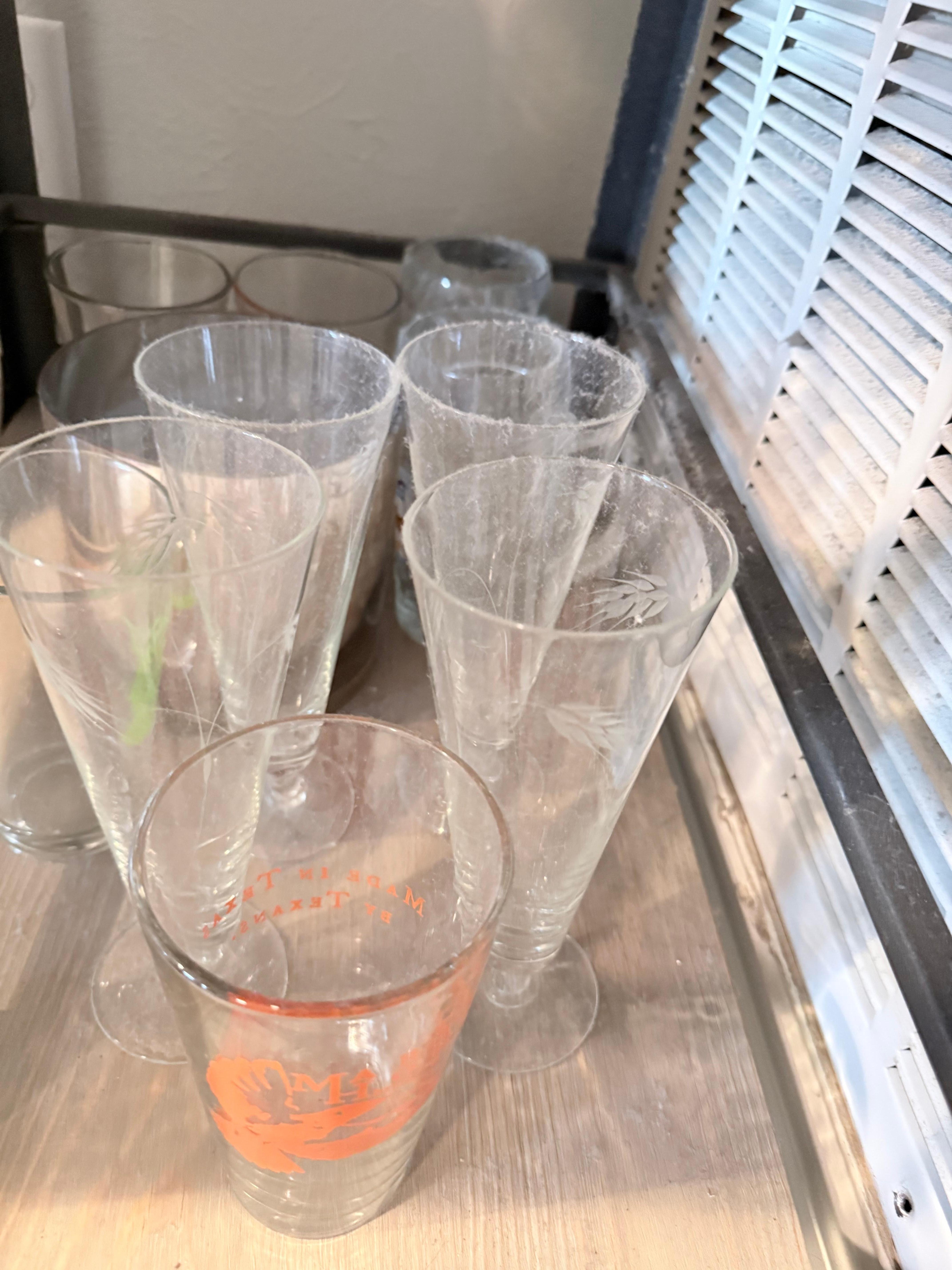 Glassware covered in dust
