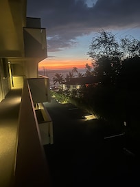 View from condo to beach at sunset