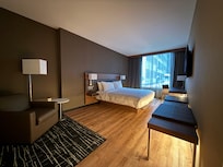 Beautiful room with king bed and lovely lighting. Loved using a steamer instead of an iron.