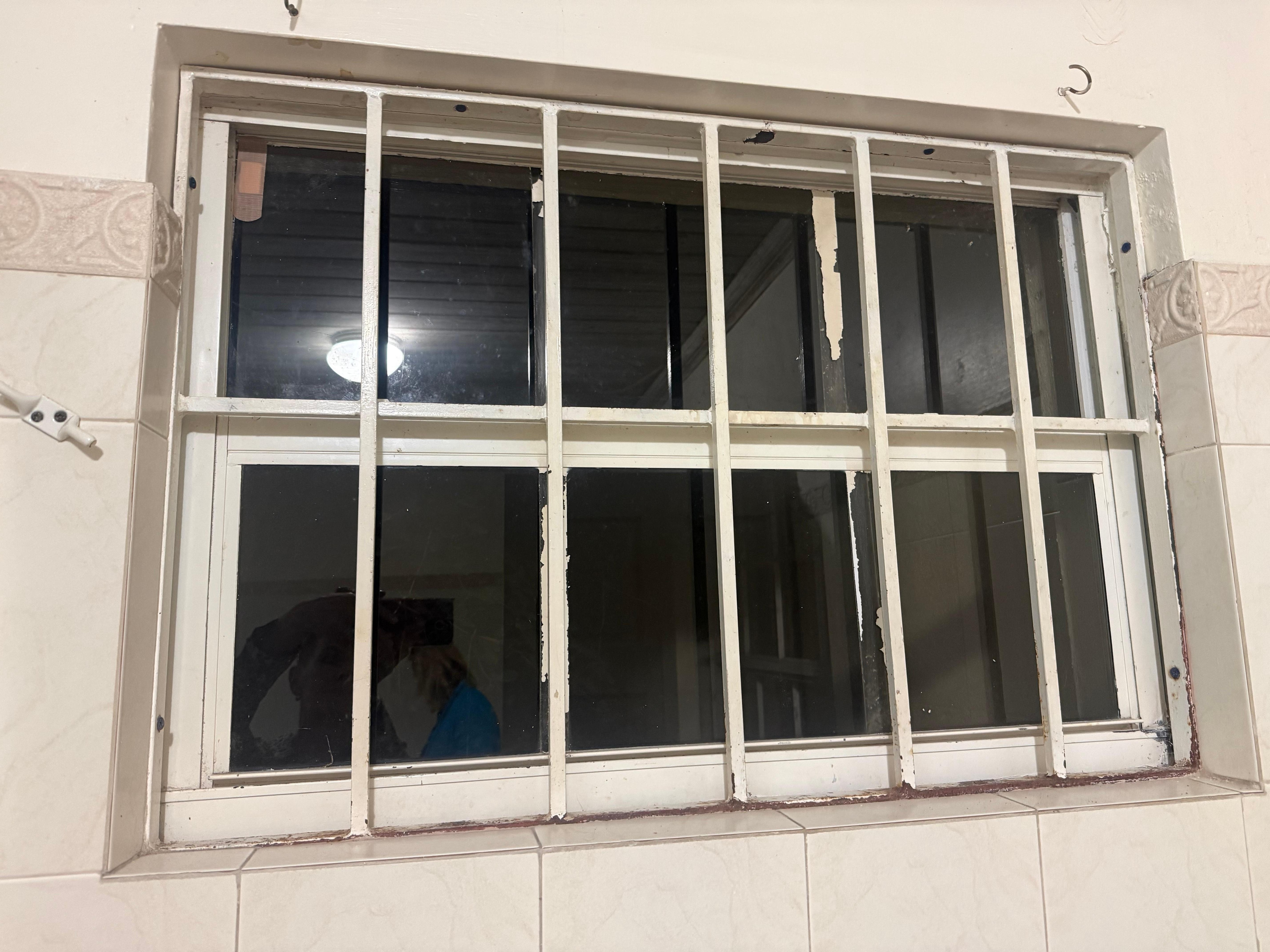 Bathroom window overlooking construction site