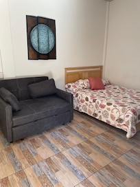 Bedroom with pullout couch. Spacious.