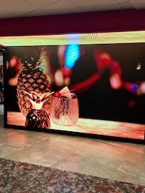 Large visual board in lobby.