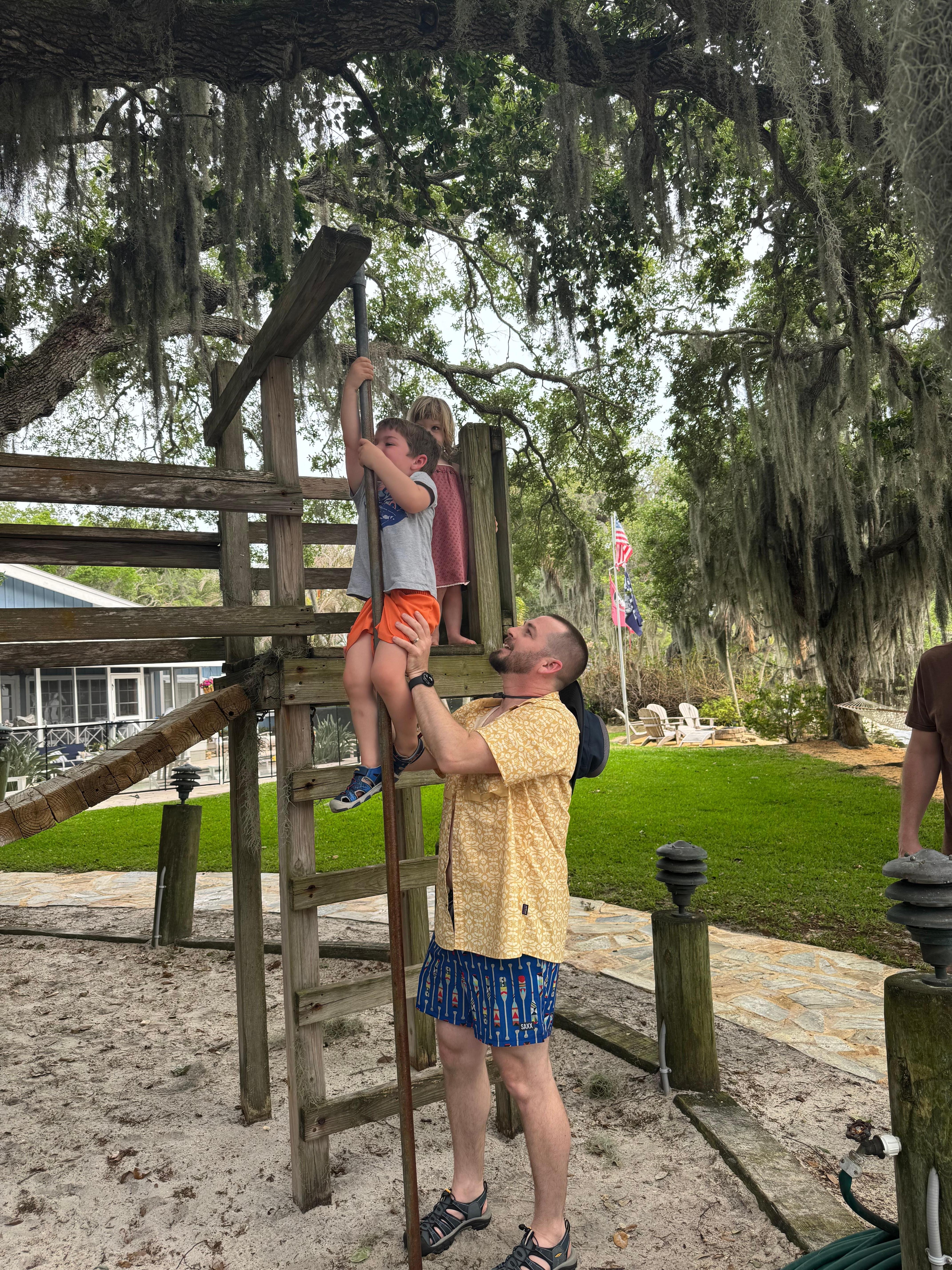 Playing on the treehouse. 