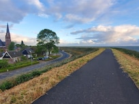 The bike path is accessible by both stairs and graded walkways.