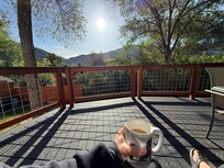 Morning coffee on the deck with this amazing view!