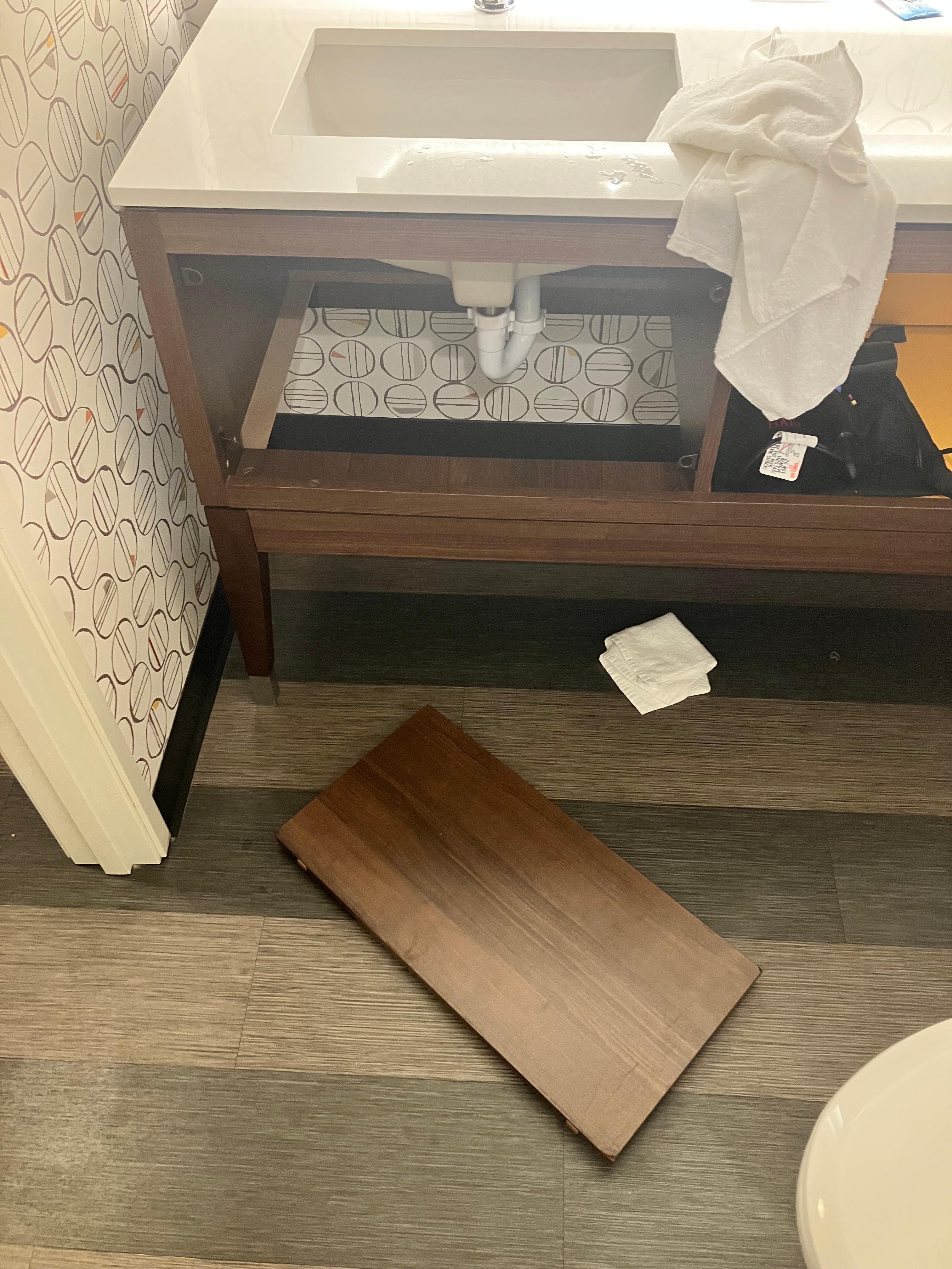 The panel that fell off directly onto my child’s foot while he was washing his hands.