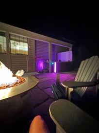 Backyard, hot tub and fire pit.