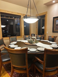 Our gathering place-- a large dining table open to the kitchen.