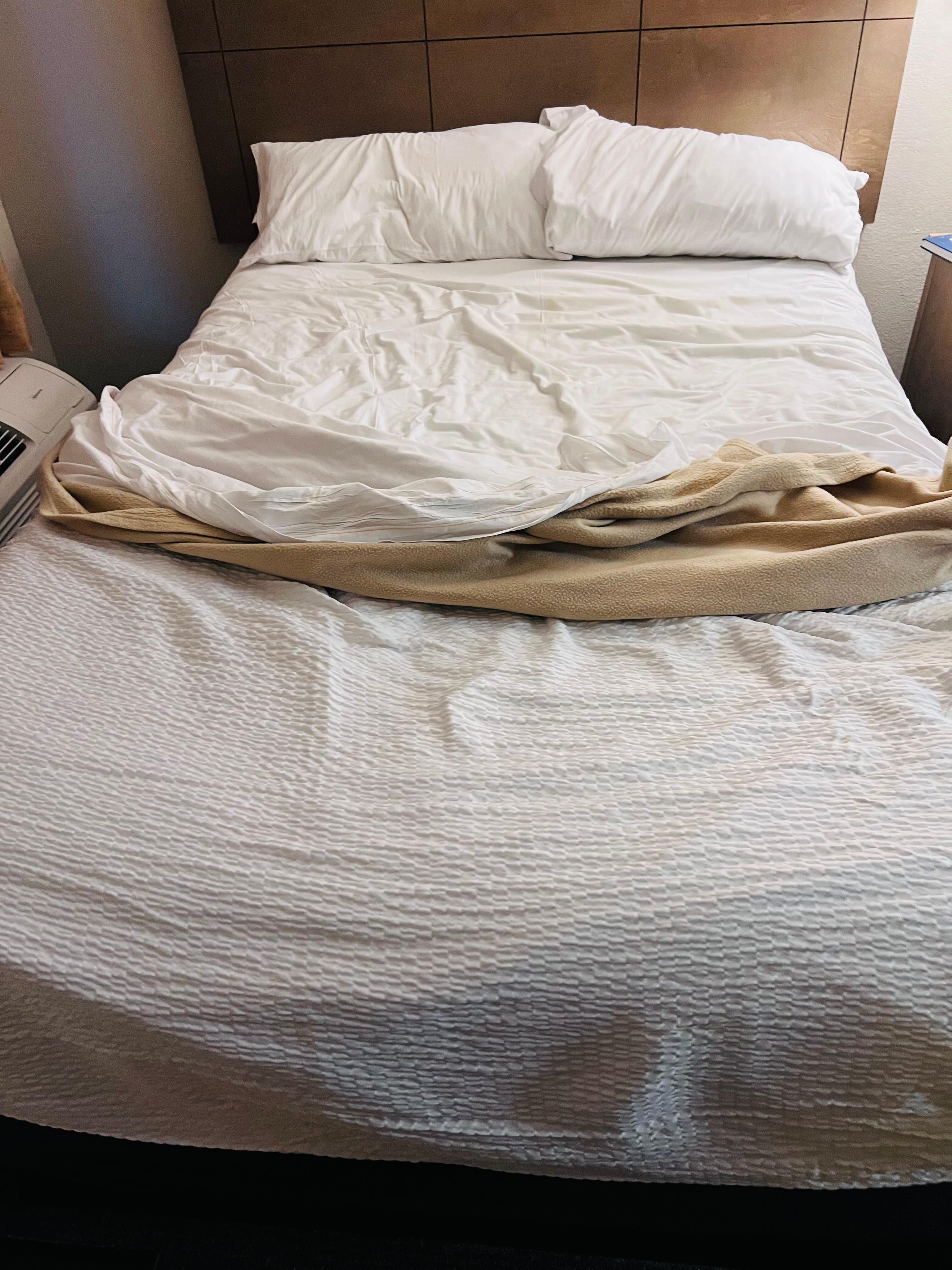 Full size bed in the bedroom