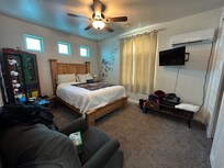 Comfy bed and sitting area.