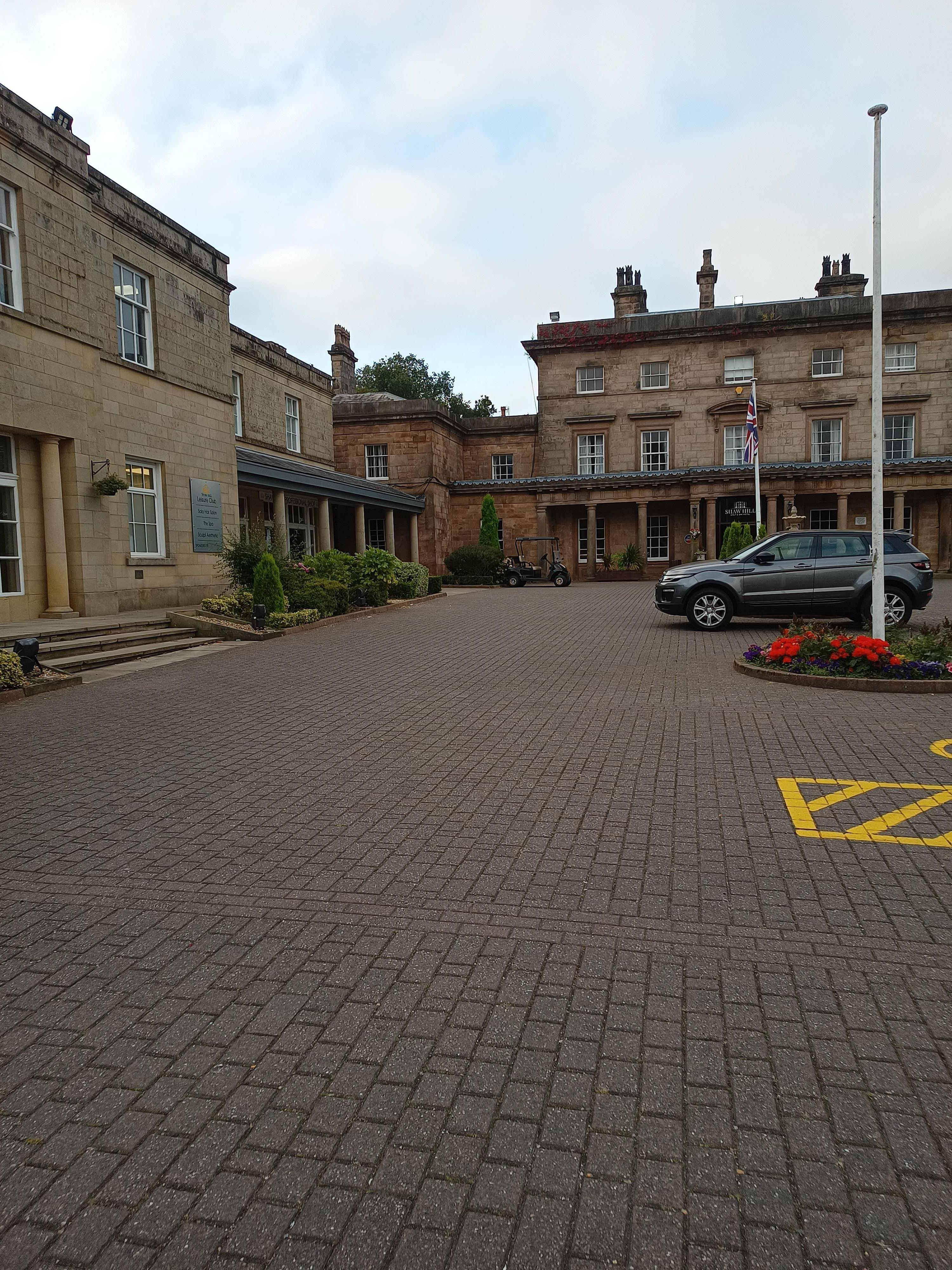 The spa, gym and pool building to the left of the hotel on this picture. 