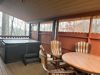Bottom floor sitting area with hot tub