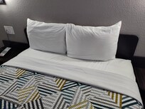 Stain on the bed sheet.