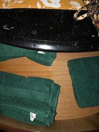 Extra bath towels wet and folded in drawer