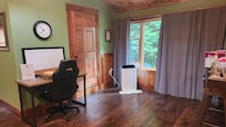 Desk and bathroom entrance