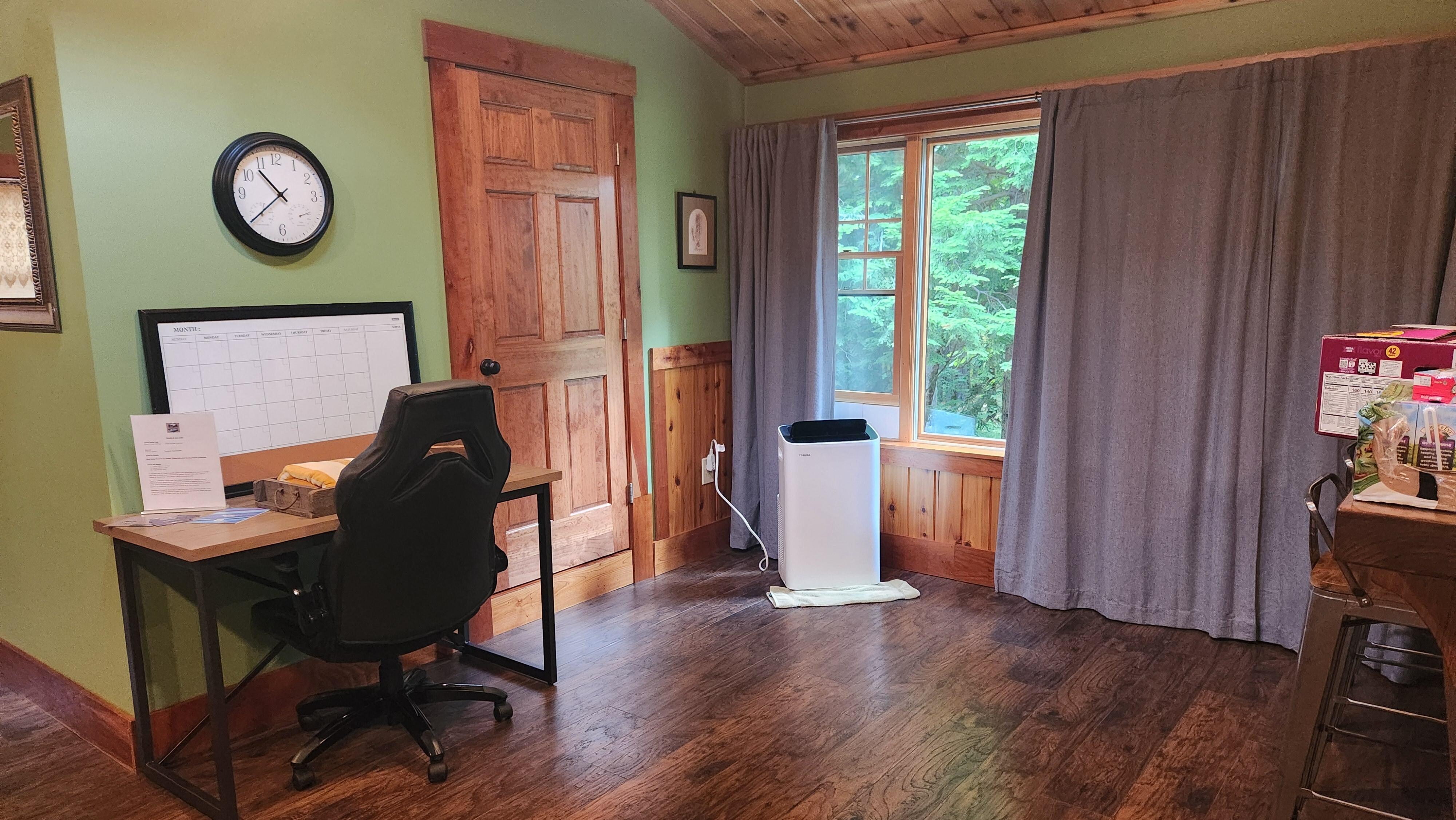 Desk and  bathroom entrance 