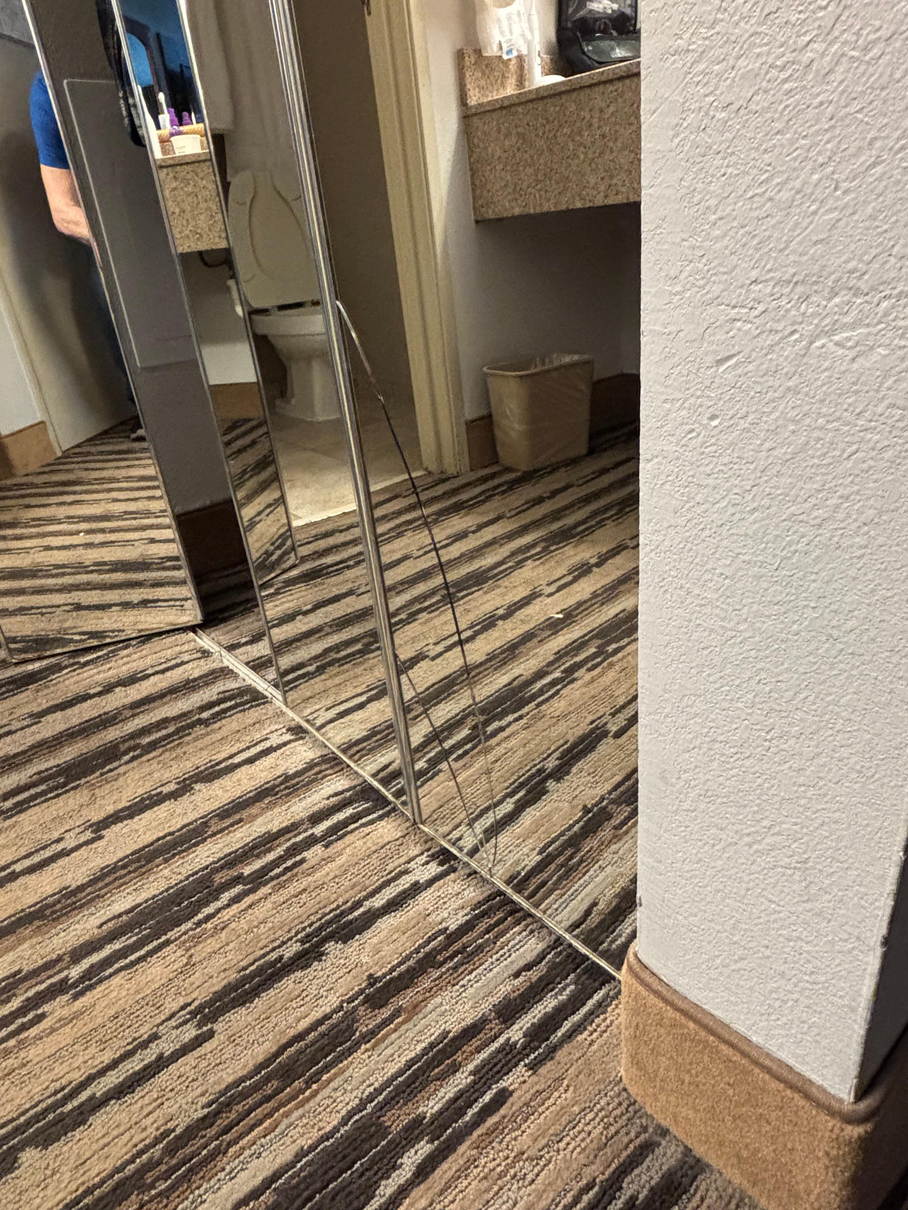 Broken mirror on closet door