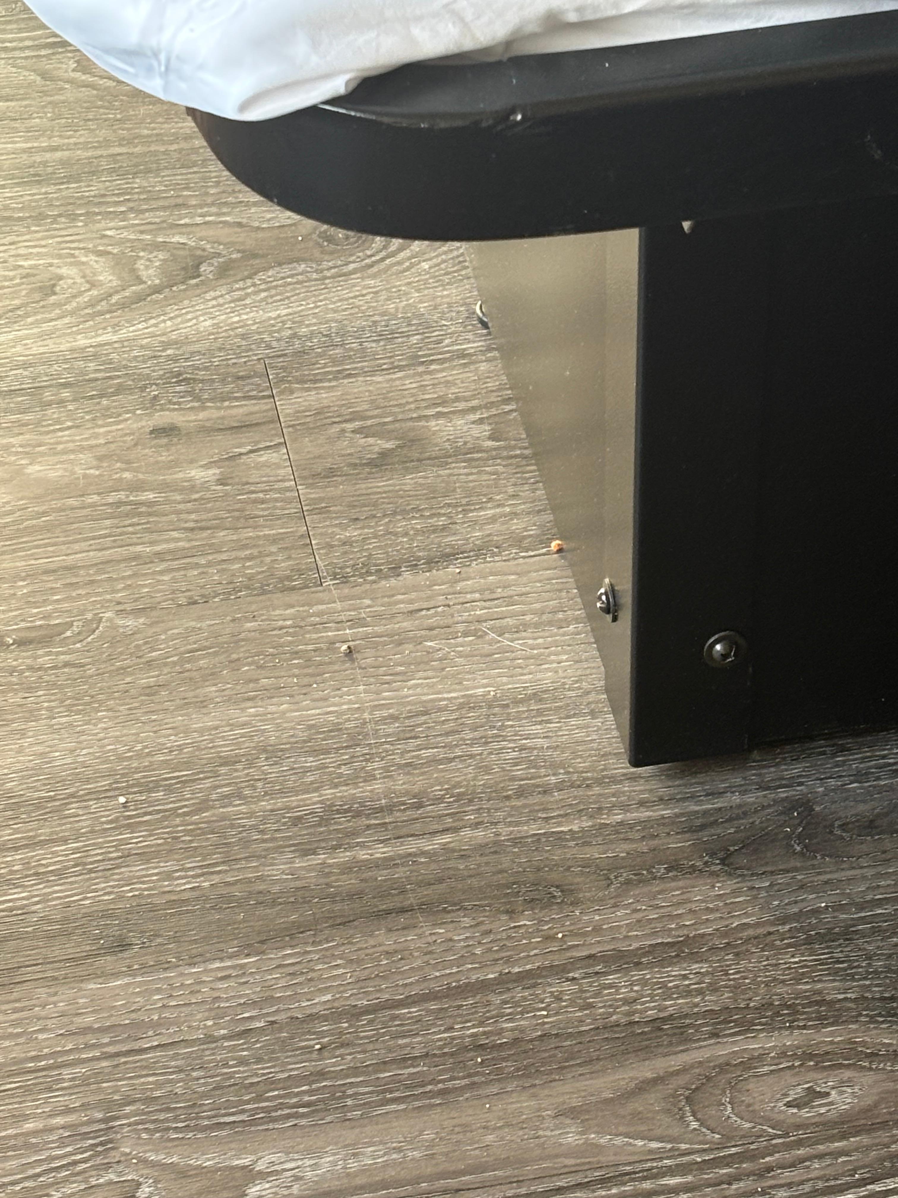 Dirty and crumbs all over the floor. 