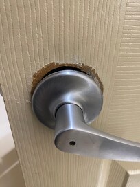 Bathroom door knob was barely on good very loose could easily get stuck in the bathroom or handle come off.