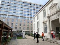 Hotel with rooms ahead, restaurant to the left and other restaurant and bar to the right in the former convent