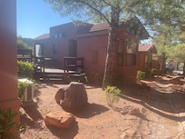 View of patio and side of the main room/home
