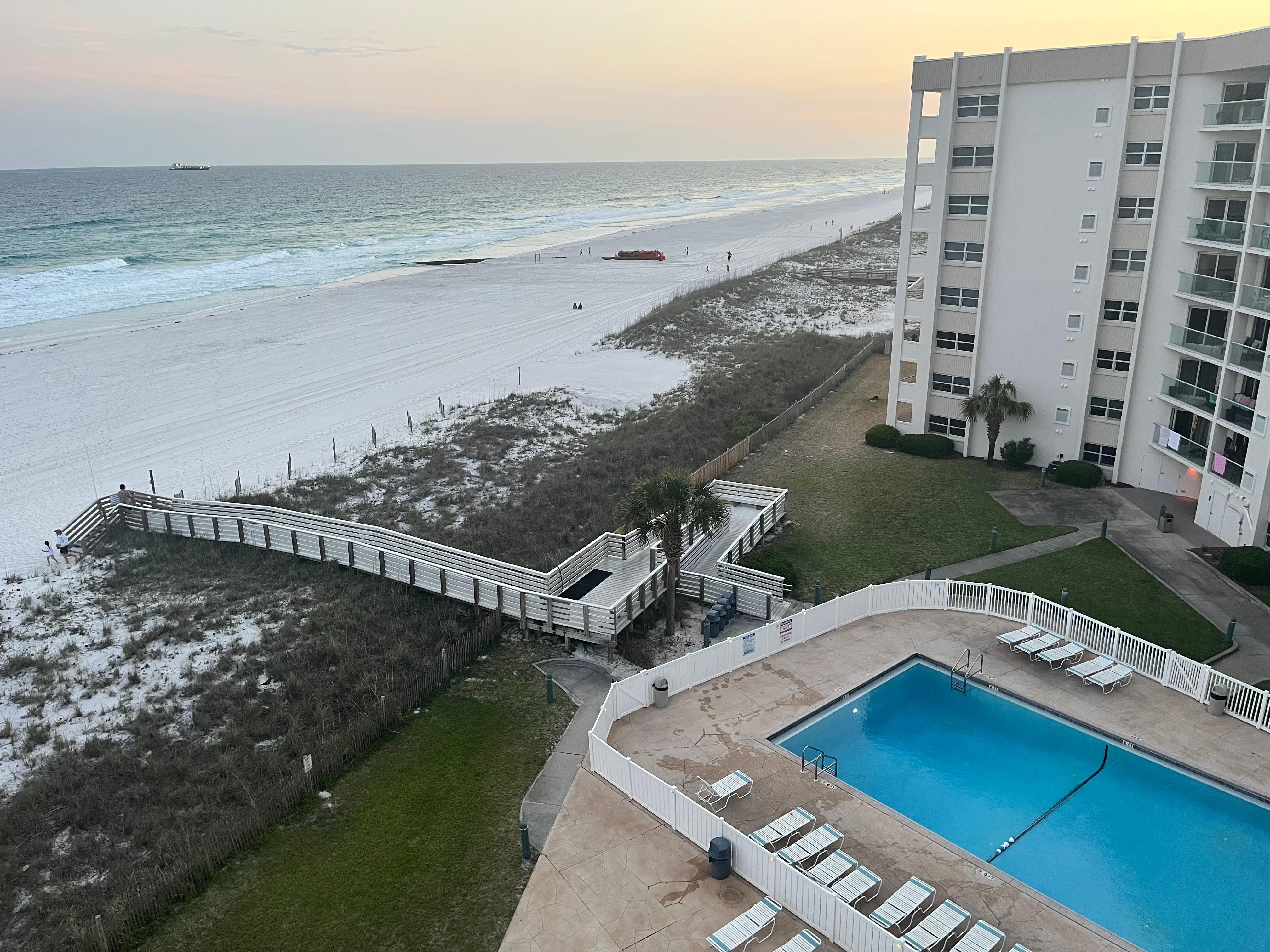 Pool and ramp to the beach-view from balcony. 