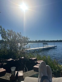 Feet up at fire pit. Comfy outdoor furniture